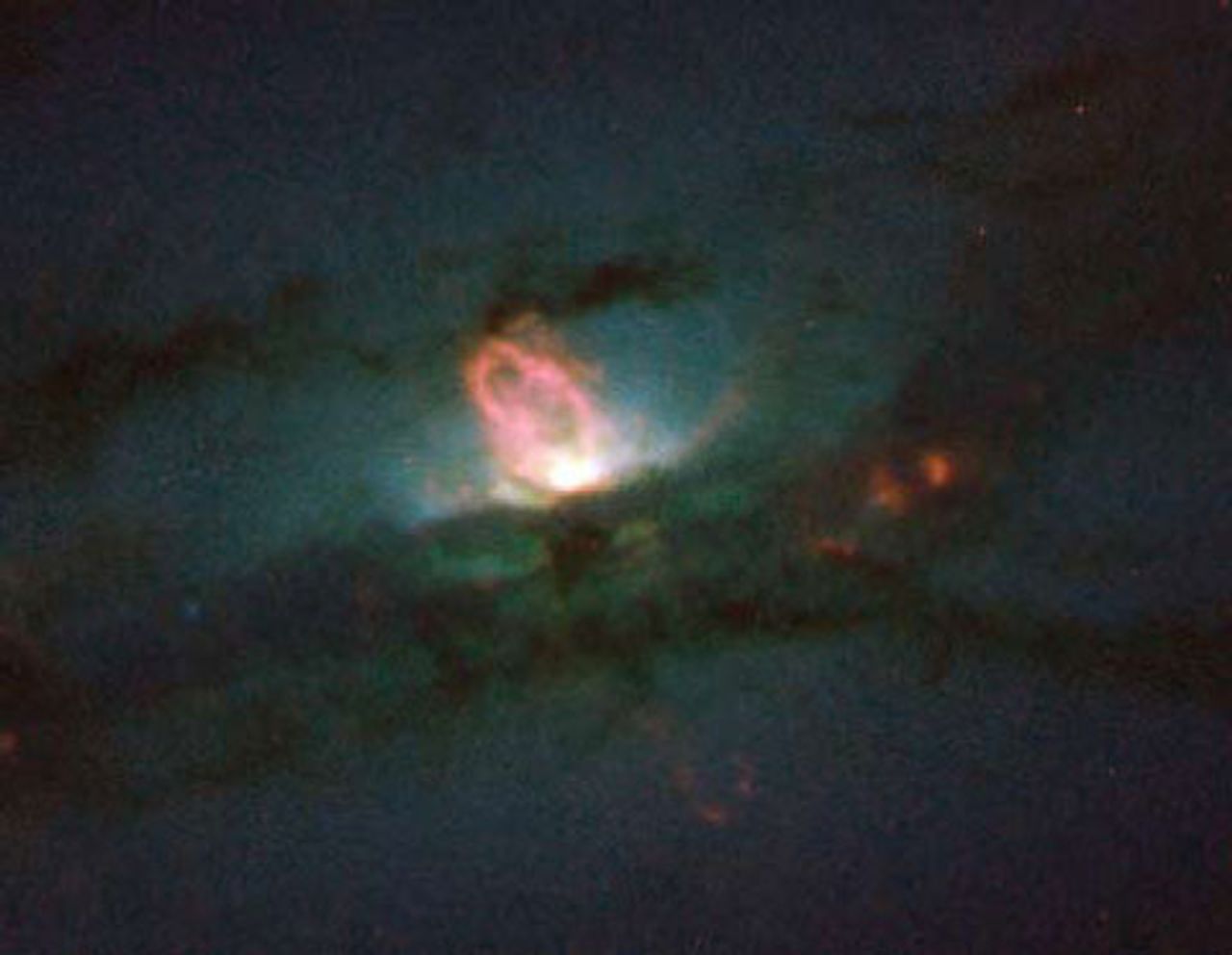 A black hole at the center of galaxy NGC 4436 expels a gas bubble hundreds of light years across